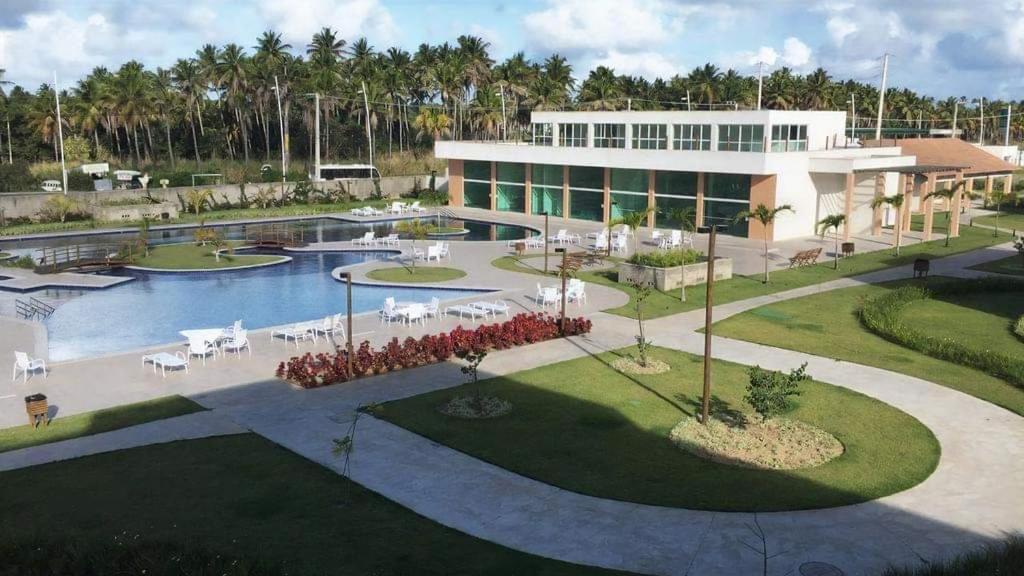 Flat Em Muro Alto-